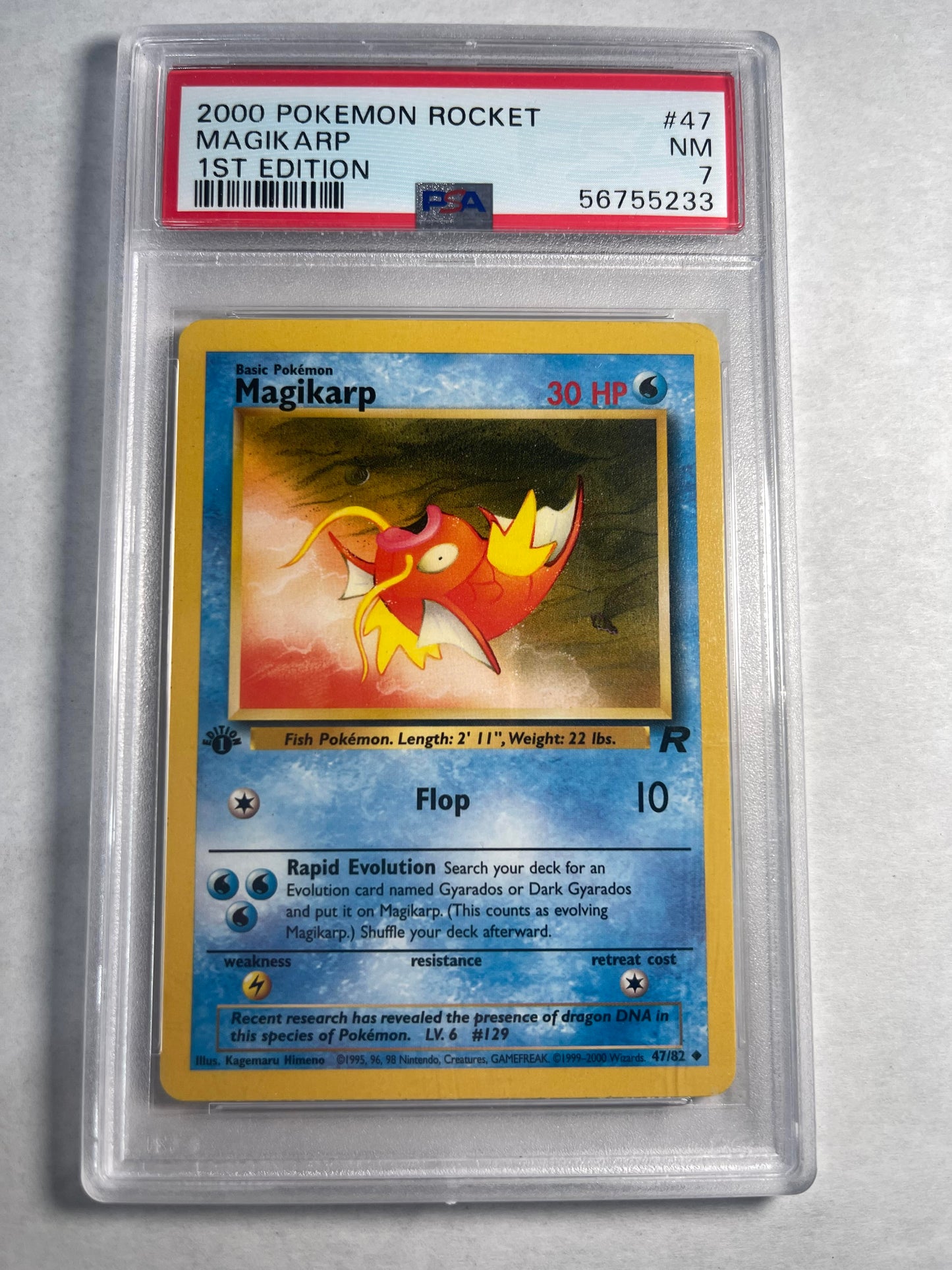 2000 1. Auflage Team Rocket Magikarp – PSA 7